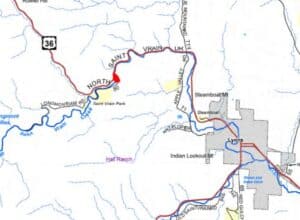 A red dot on the map shows the location of Riverside Cabins and Lodge, along U.S. Highway 36 west of Lyons.