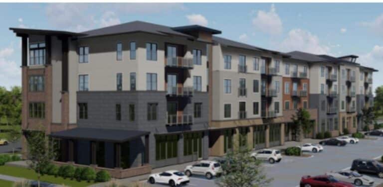 A rendering depicts the north- and east-facing sides of a four-story building with 48 residential units and retail space planned near Interstate 25 and Prospect Road.
