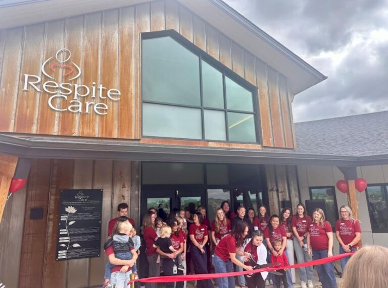 Staffers and construction partners celebrate the opening of the new Respite Care Inc. center in Timnath.